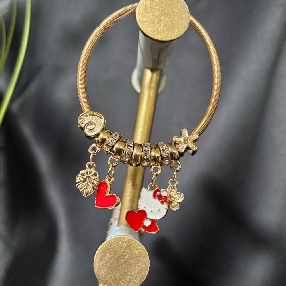 Hello Kitty Gold Bracelet with Red Charms